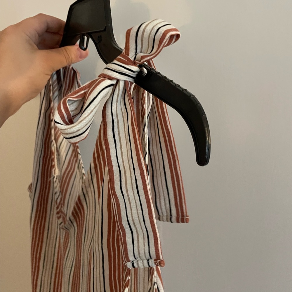 Multi-colored v-neck striped tank top with non-adjustable tying shoulders